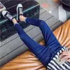 Jeans blancos puros estilo celebridad para hombre, elásticos, versión coreana, corte slim, corte recto, business casual, pantalones de alta gama para hombres de mediana edad
