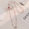 Bolso bandolera colorido con temática de bayas y pedrería, con cadena resistente para teléfono, Lujo ligero, Nicho, Exquisito, Gama alta, Moderno