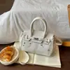 Bolso de mano informal simple transfronterizo, gran capacidad, nuevo modelo 2026 para mujer, bolso de hombro portátil para ir al trabajo, bolso de axila de alta gama