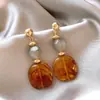 Brincos redondos com gotas de óleo estilo Maillard, luxo leve, alta qualidade, modernos, ear cuffs simples, elegantes e versáteis, brincos de nicho para mulheres
