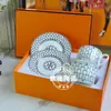 Suministro Directo de Fábrica H Marca Taza y Platillo de Café Juego de Porcelana Hueso Juego de Té de la Tarde Taza de Té Negro Taza y Platillo Doble de Lujo Ligero Regalo de Boda
