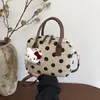 Bolso de Lunares de Nicho Súper Popular para Mujer 2026 Modelo Nuevo Bolso Cruzado Versátil para el Trabajo con Sensación de Bolso de Mano Bolso Almohada