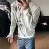 Colección de otoño transfronteriza nueva: Camiseta de manga larga con estampado moteado estilo americano para calle, unisex, moderna, top casual holgado