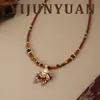 Colar Original Outono e Inverno Retrô Maillard Exquisito Moeda de Cobre Gotejamento de Óleo Pônei Luxo Acessível Corrente de Clavícula Versátil de Alta Qualidade para Mulheres