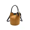 Bolso de Mano para el Trabajo 2025 Nuevo Estilo Bolso Cubo Simple y de Moda Bolso de Hombro Versátil Bolso de Atmósfera de Alta Gama para Mujer