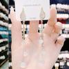 Celebridad de Internet Moda Pendientes de Borla de Circonita Incrustados de Diamante Celebridad Femenina Diseño de Nicho Sencillo Joker Elegante Pendientes Elegantes Venta al por Mayor