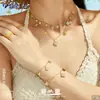 Misterioso conjunto de joyería de acero inoxidable estilo europeo y americano, súper brillante, con circonitas completas, diseño de flor de cuatro hojas, multi-accesorio, pulsera y cadena para clavícula DIY para mujeres