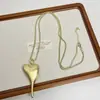 Collar con Colgante Largo Irregular en Forma de Corazón Cepillado Plateado Transfronterizo para Mujer, Cadena de Suéter de Alta Gama, Accesorio de Moda para Fashionistas