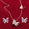 Explosiones Europeas y Americanas Venta al por Mayor Acero Inoxidable Colgante de Mariposa Collar Pendientes traje Cadena para Clavícula Elegante Celebridad de Internet Joyería Sencilla