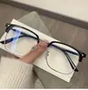 Gafas retro de media montura con línea de cejas poligonal para hombre 8021 Guerrero Negro gafas fotocromáticas anti-luz azul elegantes