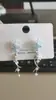 Pendientes de Bola de Pelo Copo de Nieve Peludo para Mujer en Otoño e Invierno Atmósfera Navideña Dulces Pendientes y Aretes de Lujo Ligero de Gama Alta