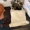 Venda Direta de Fábrica de Camisola Popular para Mulheres no Sudeste Asiático com Bojos, Design Versátil com Costas Vazadas e Alças Finas