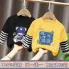 Camiseta de manga larga para niño, algodón puro, nuevo estilo otoño 2026, camiseta básica de primavera y otoño para niños, de rayas, imitación de dos piezas