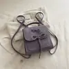 Mochila simple y elegante estilo universitario para primavera y verano, nueva bolsa multifuncional de moda, bolso de mano y bolso cruzado de moda para mujer