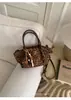 Bolso súper popular de nicho con estampado de leopardo para mujer, nuevo bolso cruzado versátil de moda 2026, bolso de mano de gamuza para el trabajo