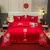 Juego de ropa de cama para boda nuevo estilo chino, rojo vibrante bordado, hecho de algodón puro, juego de cuatro piezas, perfecto como regalo de boda para recién casados