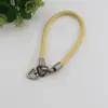 Cordão de Pulso para Celular em Couro com Fivela Triângulo Giratória 360 graus Corda de Couro PU Anti-perda Cordão Versátil Durável