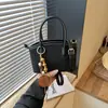 Bolso de mano vintage transfronterizo para mujer, nueva colección otoño 2026, bolso tipo cubo de nicho y minimalista, adecuado para ir al trabajo y uso casual, estilo bandolera