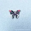 Accesorios de joyería de aleación caliente transfronterizos pendientes colgantes de mariposa impresos pulsera collar accesorios de joyería venta directa de fábrica