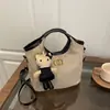 Bolsos de Gamuza de Venta Caliente de Principios de Primavera para Mujer 2026 Moda Nuevo Bolso Cruzado Versátil Bolso de Mano Bolso Cubo Bolso Tote Pequeño para Mujer