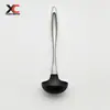 Venta al por mayor de fábrica Sartén antiadherente resistente a altas temperaturas Mango especial de acero inoxidable Espátula Juego de utensilios de cocina de silicona Pala para cocinar en la cocina