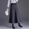 Saia rodada, de comprimento médio, em linha A para mulheres, nova coleção outono/inverno 2026, moderna, elegante, versátil e que afina a silhueta