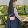 Hilo de bordado de camelia con patrón de diamantes bolso mini pequeño estilo Chanel elegante versátil bolso de mano de alta gama bandolera bolso para niños moderno