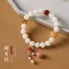Pulsera de Raíz de Bodhi de Jade Blanco Hilo Estilo Chino Estilo Bosque Fresco Cuentas de Oración Pulsera de Muñeca Flor de Loto Borla Fuente Mayorista
