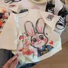 Nuevas Camisetas de Algodón Puro de Manga Corta para Niños y Niñas Verano 2025, Populares Lindos Dibujos Animados Muñeco Tridimensional Tops de Media Manga Modernos