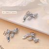Popular on-line popular luz de luxo prata zircão unha joias flash arco pérola pingente tassel DIY nail drill