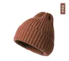 Sombrero de punto nuevo de rayas verticales con punta transfronterizo otoño e invierno cálido unisex versátil de dopamina color sólido sombrero de pareja