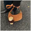 Bolsa de Mão Fashion de Nicho de Luxo para Mulheres 2025 Novo Modelo Simples Bolsa de Ombro/Axila Estilosa Bolsa Chic para o Dia a Dia