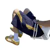 Shorts de verano de moda para hombre 2026 con un toque de alta gama, diseño creativo de tres rayas, pantalones casuales de playa holgados de longitud media
