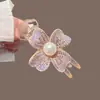Pinza para el pelo de moño de bola para mujer, simple, de alta gama, para coleta, elegante, versátil, exquisita pinza, accesorios para el pelo para mujer, perla, trébol de cuatro hojas