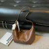 Bolsa Texturizada Estilo Retrô para Mulheres 2026 Nova Outono Casual Versátil para o Trabalho Bolsa Transversal Grande Capacidade Bolsa de Ombro