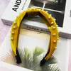 Directo de fábrica nueva versátil terciopelo uña nudo de perla diadema color coreano medio nudo de perla anillo para el pelo