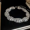 Traje de collar y pendientes de diamante ovalado europeo y americano exagerado luz de lujo alta gama cadena de clavícula nicho moda joyería al por mayor
