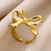 Europa y Estados Unidos nuevo anillo de lazo chapado en oro de 18 quilates acero inoxidable simple moda Joker anillo fabricantes venta al por mayor