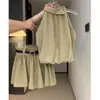 Estilo Moderno e Simples, Conjunto Versátil de Menina Popular: Top Regata sem Mangas com Gola Halter + Saia Curta Plissada de Cintura Alta