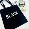 Bolsa de Lona Estilo Coreano Simples e Versátil de Grande Capacidade Personalizada com Letras Brancas e Pretas Bolsa de Mão Casual Literária para Estudantes e Pessoas que se Deslocam