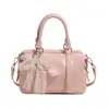 Corea del Sur Moda Tendencia Estilo Crema Simple Portátil Bolso Almohada de Cuero Suave Moda Femenina Versátil Casual para Viaje Bolso Cruzado