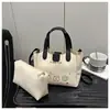 Novo Conjunto de Duas Peças Estiloso com Estampa Fofa 2025 Moda Mãe-Filha Simples para o Dia a Dia Bolsa Texturizada de Mão Bolsa de Ombro para Mulheres