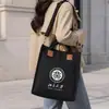 Bolsas de lona para eventos escolares, bolsas de mano para instituciones de capacitación grupal, impresión de logotipo personalizado, bolsas promocionales para la temporada de regreso a clases, directo del fabricante