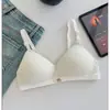 Nueva versión fina para niñas, directo del fabricante, ropa interior sin costuras push-up para busto pequeño anti-caída para mujeres, sujetador sin varillas