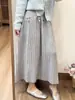 Outono Inverno 2026 Novo Estilo Coreano Ins Casual Versátil Emagrecedor Bainha Larga Cintura Alta Comprimento Médio Saia de Tricô Feminina