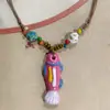 Collar con colgante de campana de mariposa de cerámica de estilo étnico retro para mujer, diseño nuevo y moderno, cadena larga para suéter, accesorios