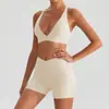 Conjunto de Sutiã Esportivo de Manga Curta com Gola Halter e Bolso para Corrida e Yoga Calça Longa e Curta para Mulheres