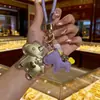 Nuevo Estilo Llavero "Caballo de Dinero" con Dorado, Llavero de Coche, Colgante para Bolso, Regalo del Año del Caballo