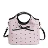 Moda de Verano Bolso Pequeño con Lazo para Mujer 2025 Nuevo Bolso de Hombro/Mano para Axila Satchel Cubo con Textura Linda