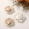 Novo estilo coreano estilo pequeno fragrante couro retrô camélia diy broche de mão presilha de cabelo flor de sapato acessórios de vestuário atacado